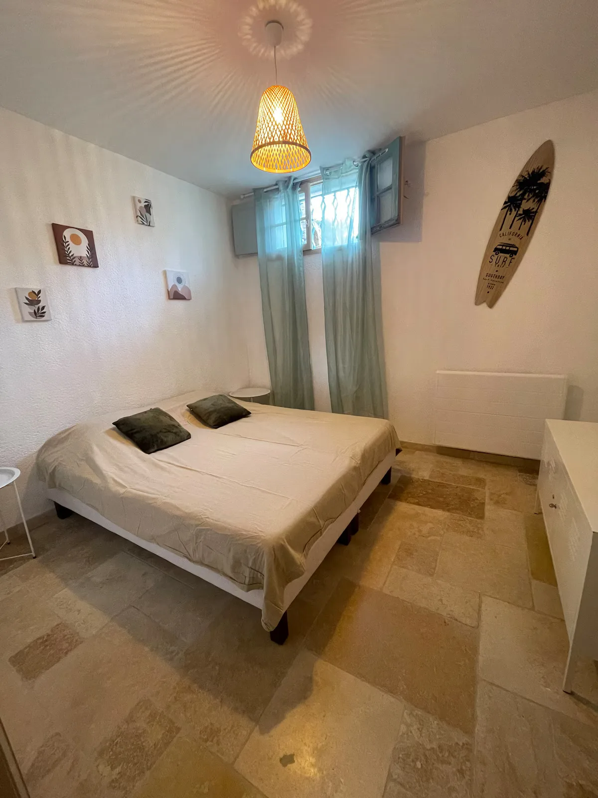 Decorated double bedroom with storage chest